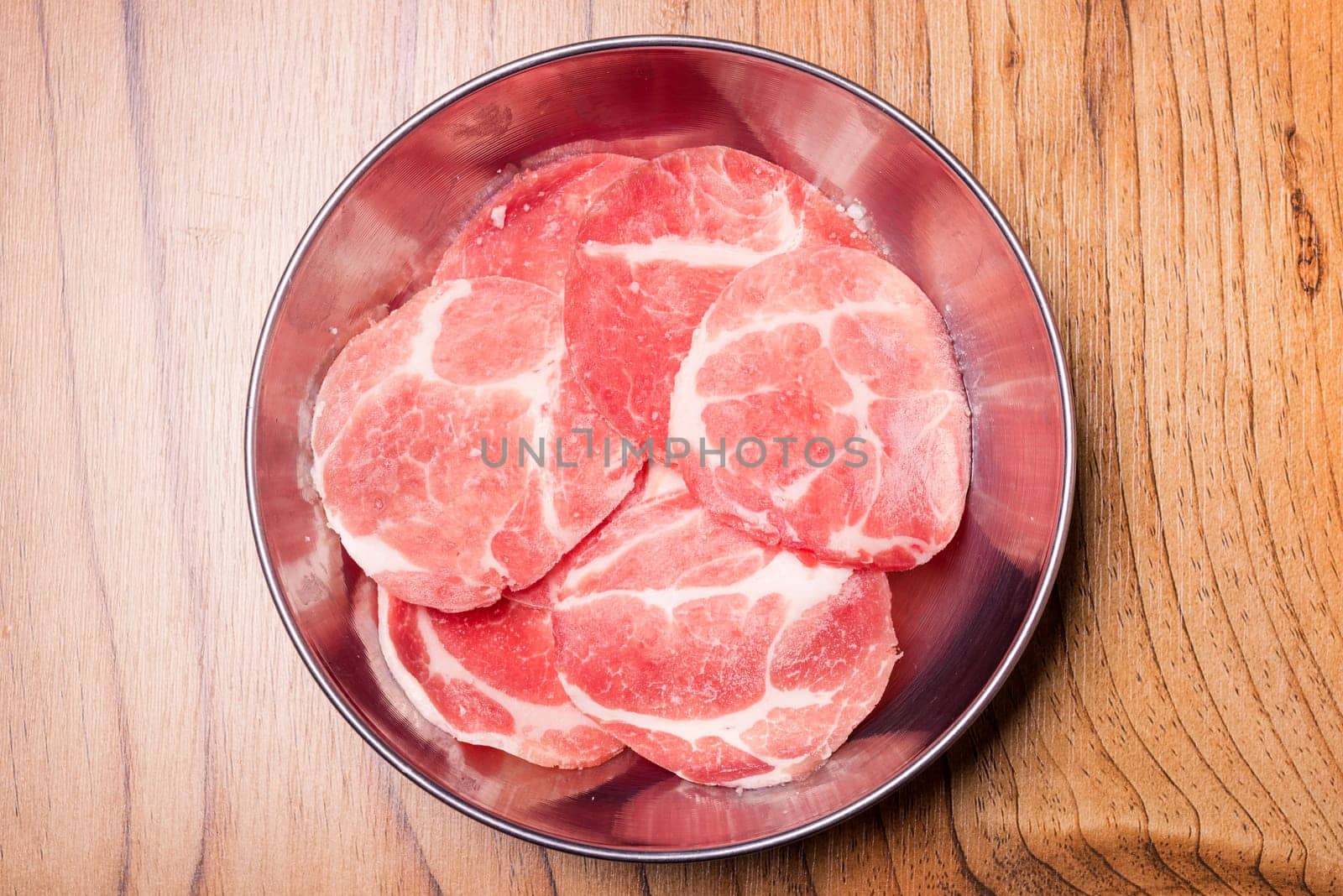 Raw pork on plate, Korean traditional style fresh pork beef belly BBQ, Japanese meat hot pot or Shabu in the restaurant, barbecue food