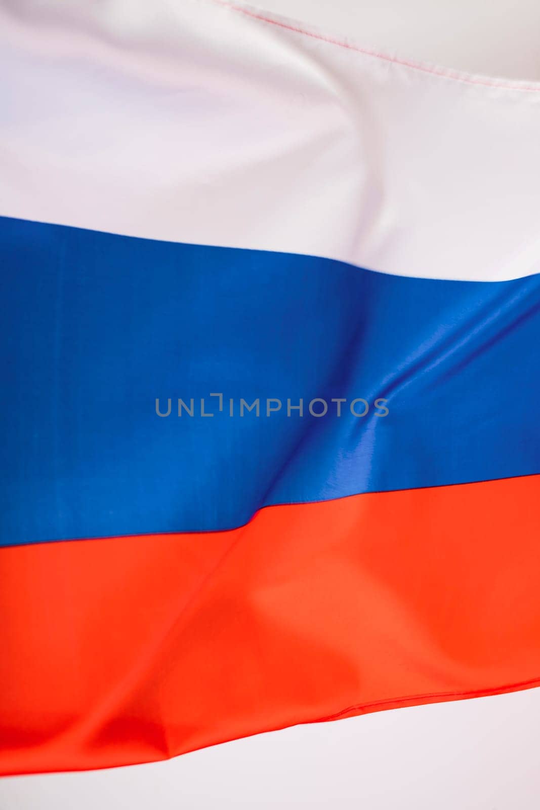 Waving colorful national flag of russia. Russian-Ukrainian conflict concept