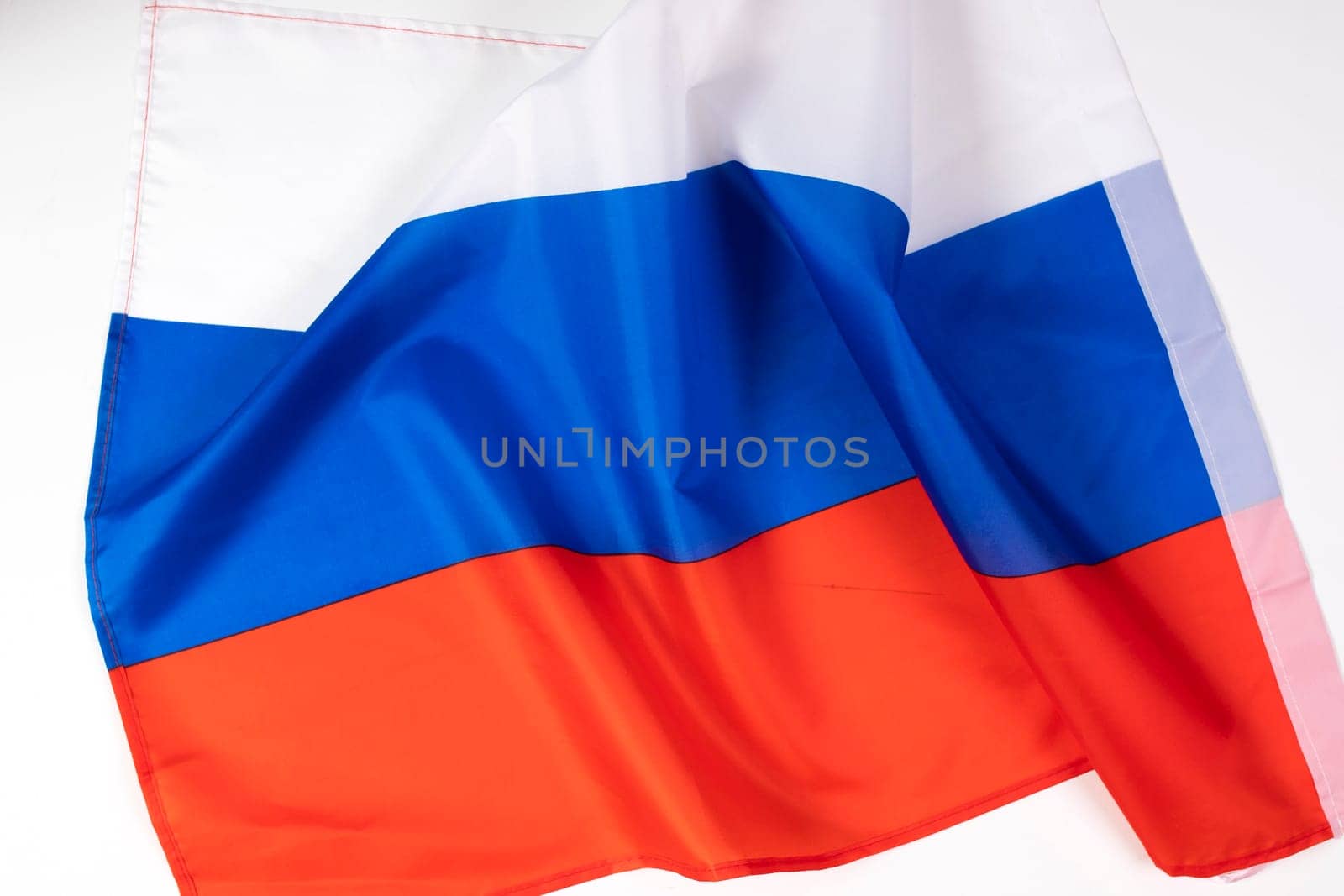 Waving colorful national flag of russia. Russian-Ukrainian conflict concept