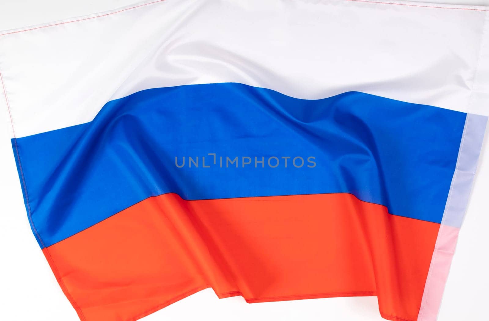 Waving colorful national flag of russia. Russian-Ukrainian conflict concept