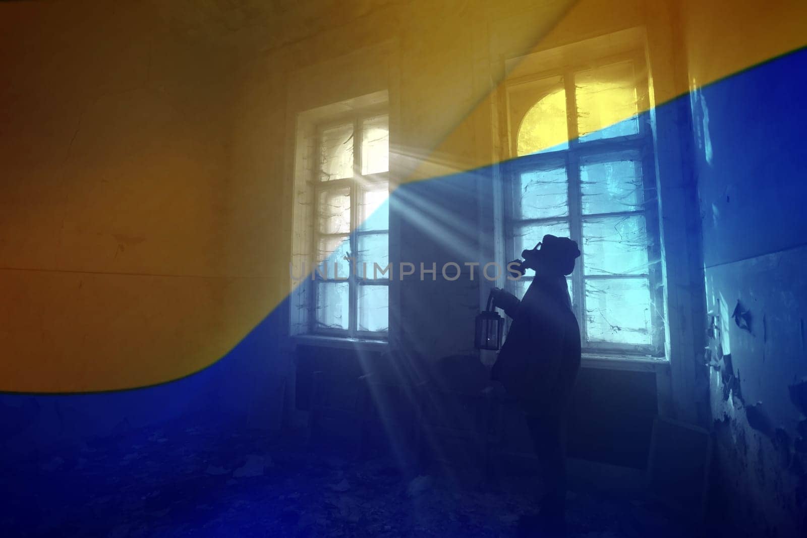Concept of Russian forces captured the Cernobyl power plant. Person with gas mask and the Ukrain flag