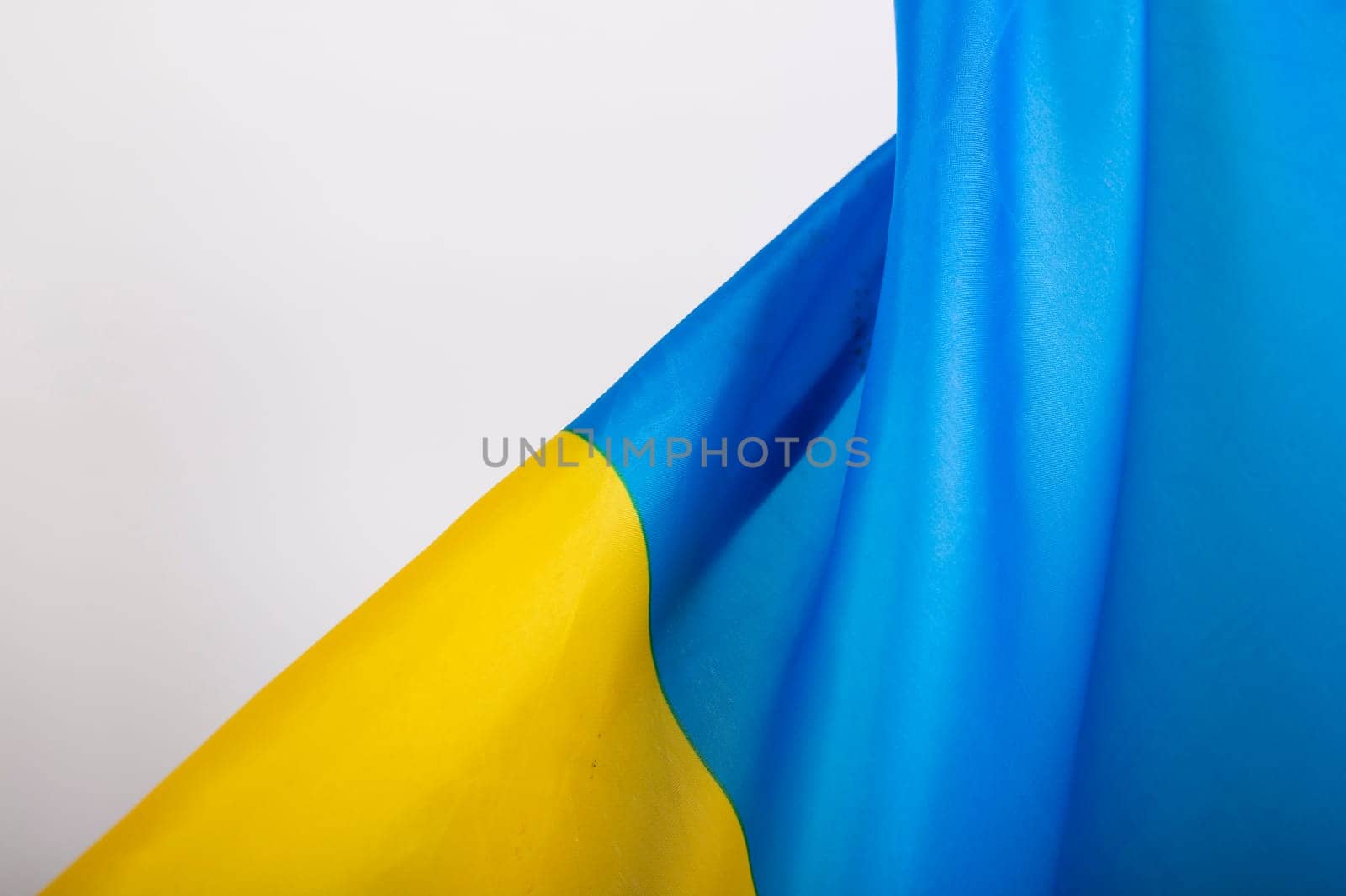 Flag of Ukraine. Blue and yellow colors. Close up shot, background