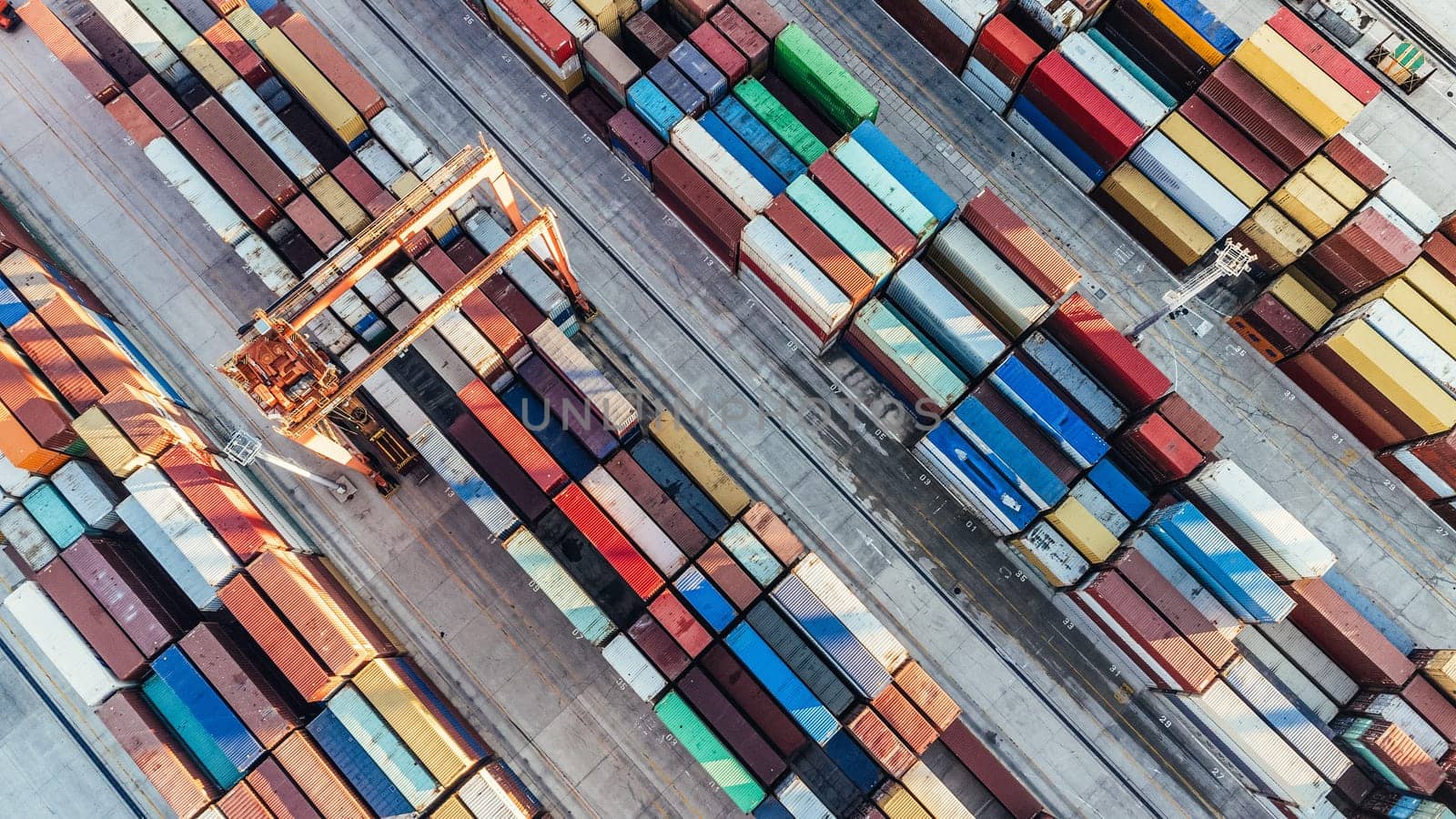 Aerial view of shipping container port terminal. Colourful pattern of containers in harbor. Maritime logistics global inport export trade transportation
