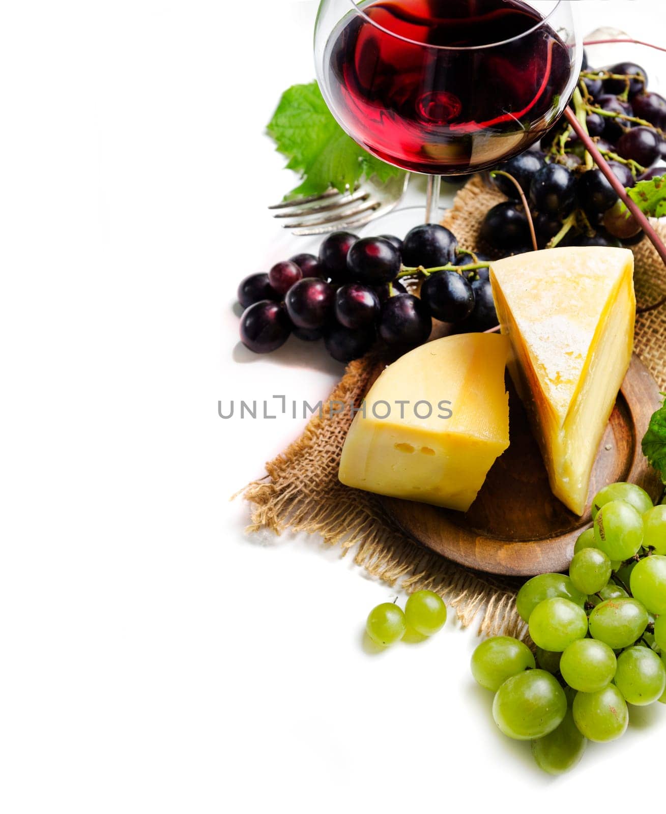 Wine and cheese on white background