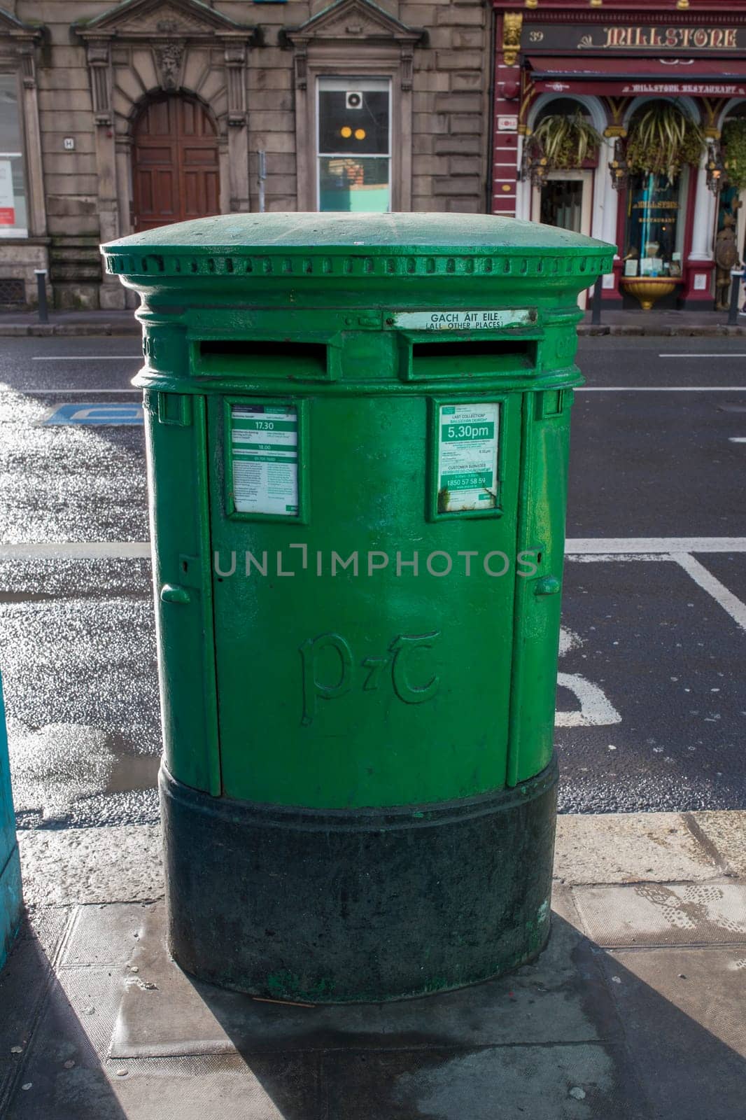 Dublin, Ireland - Feb 9th, 2020: Dublin green post box. Dublin, Ireland