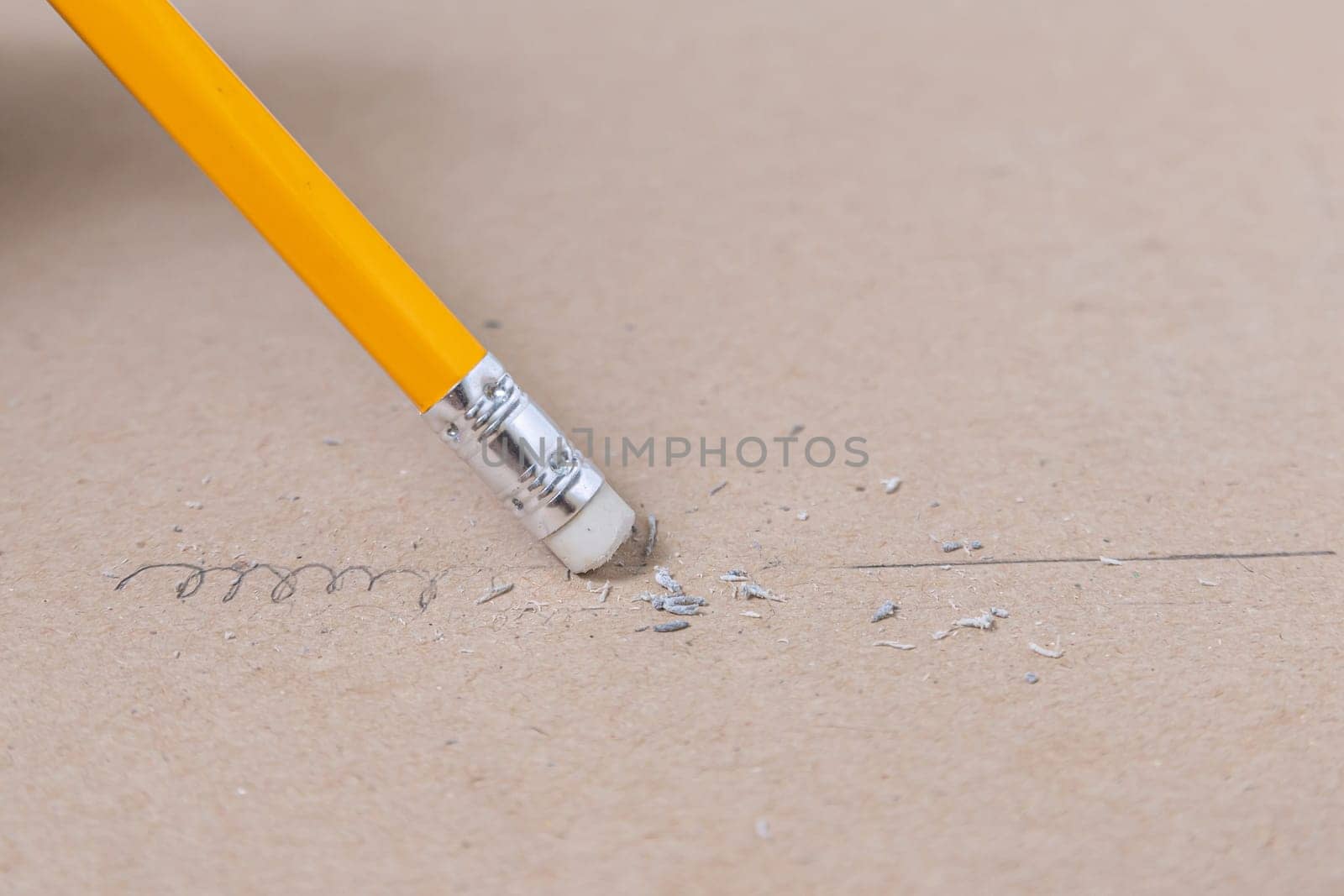 Close up a eraser pencil a straight line and crooked line, Mistake and Unsuccessful concept, Eraser pencil with brow paper