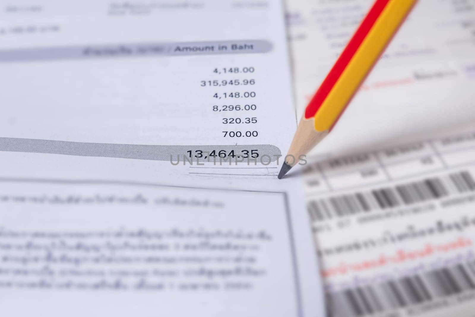 Utility energy bill with pencil blurred background, Bill and saving concept