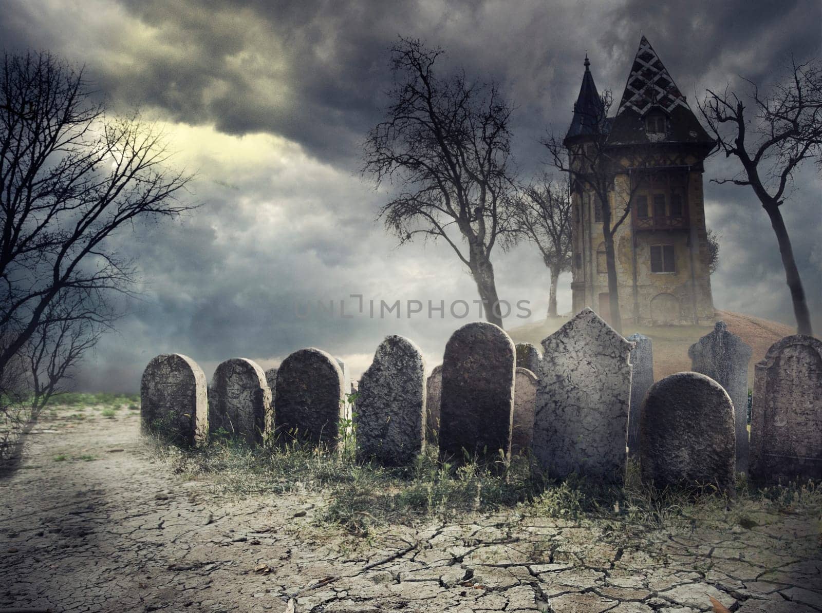 Hounted house on spooky graveyard