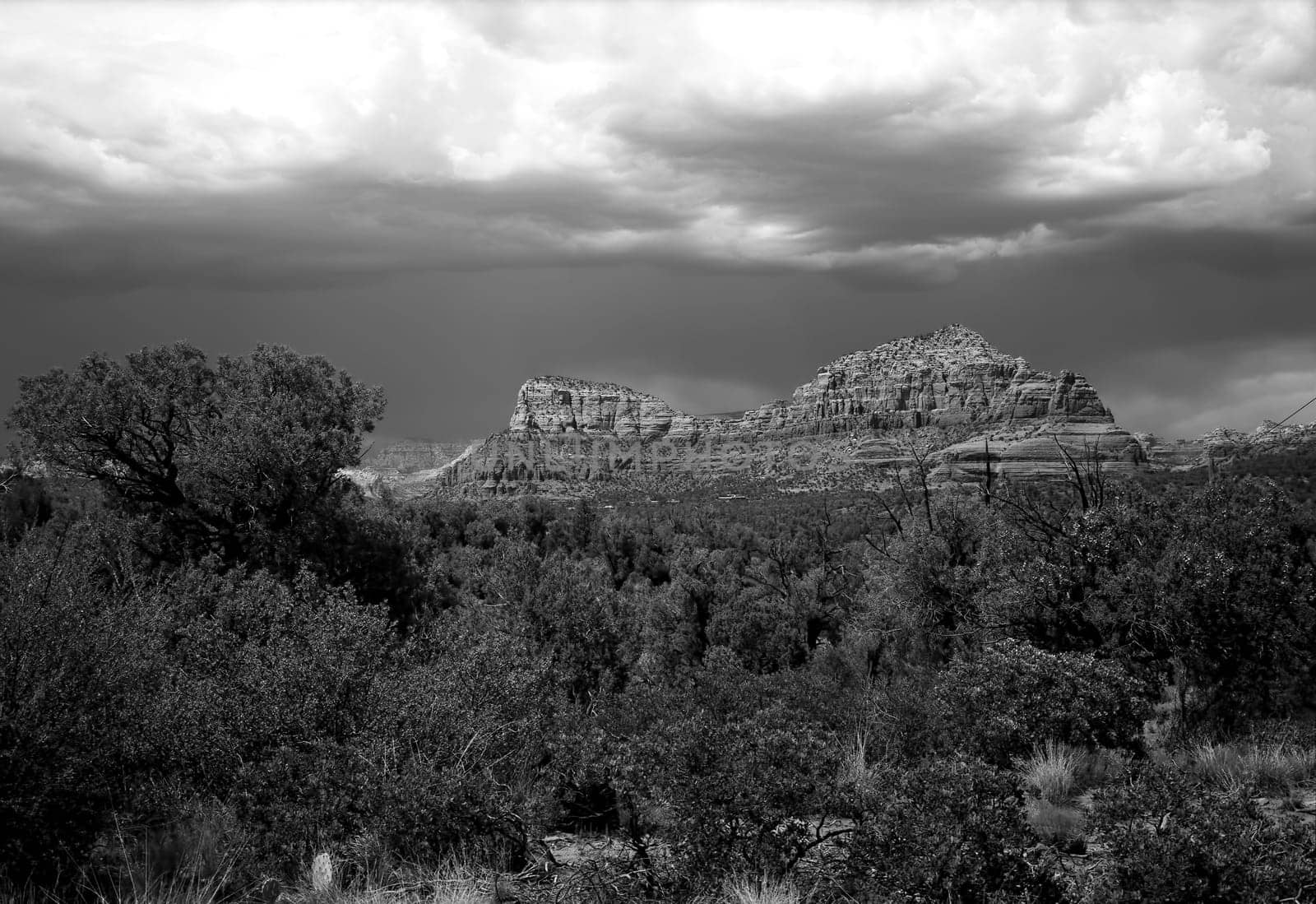 Rock country mountains surrounding Sedona Arizona in monochrome black and white