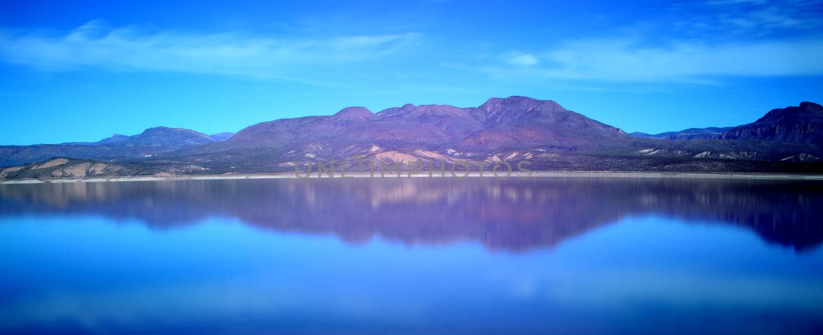 Panorama Mountain and reflections of Mountain in Roosevelt lake Central Arizona