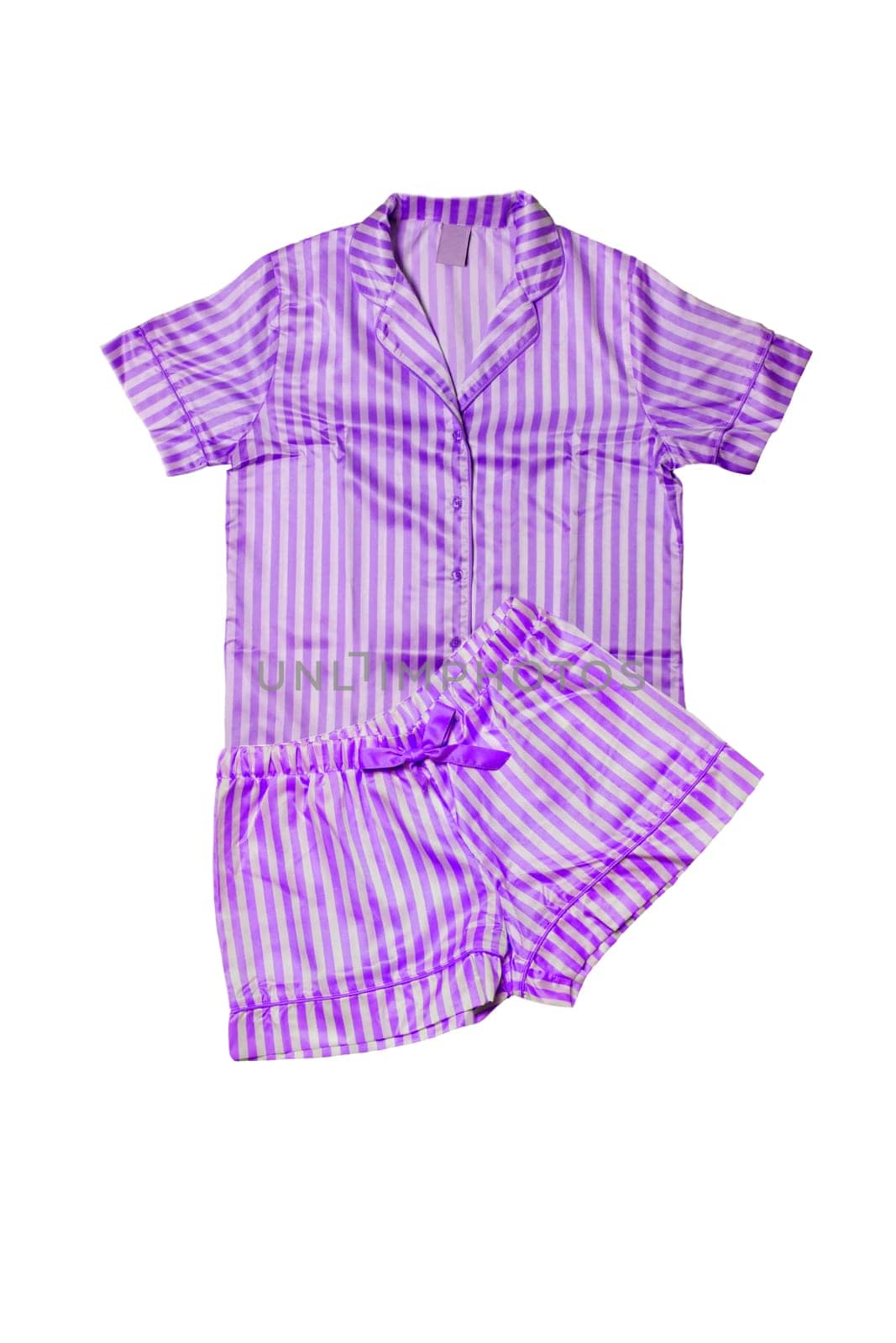Night gown isolated. Close-up of pink female cotton sexy nightwear summer set of shorts and a top or shirt isolated on a white background. Fashionable night wear or nighties.
