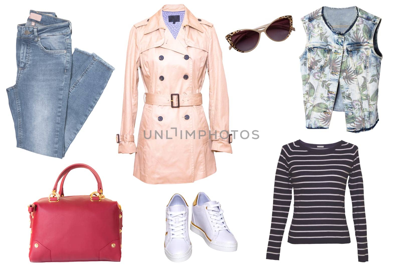 Collage woman clothes. Set of a stylish and trendy women coat, a blouse or shirt, white shoes, a handbag, a jeans and other accessories isolated on a white background. Latest fashion trends.