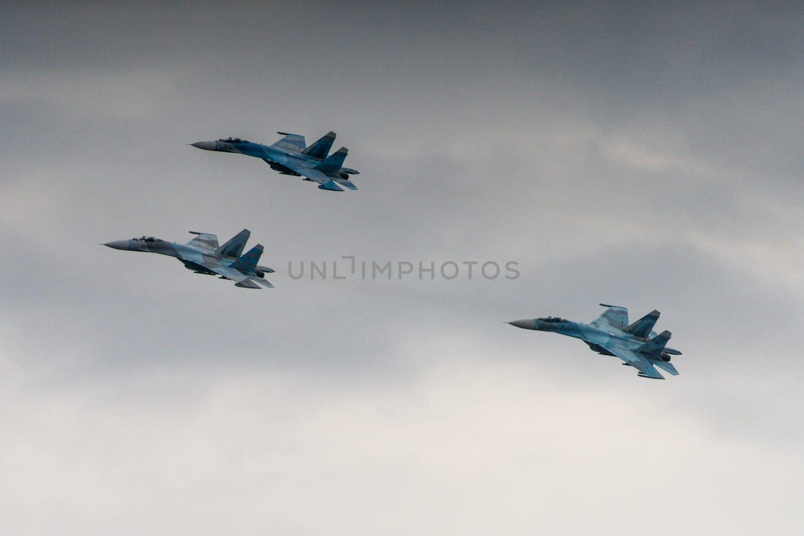 flight of three supersonic fighters SU 27 of the Russian Air Force in flight