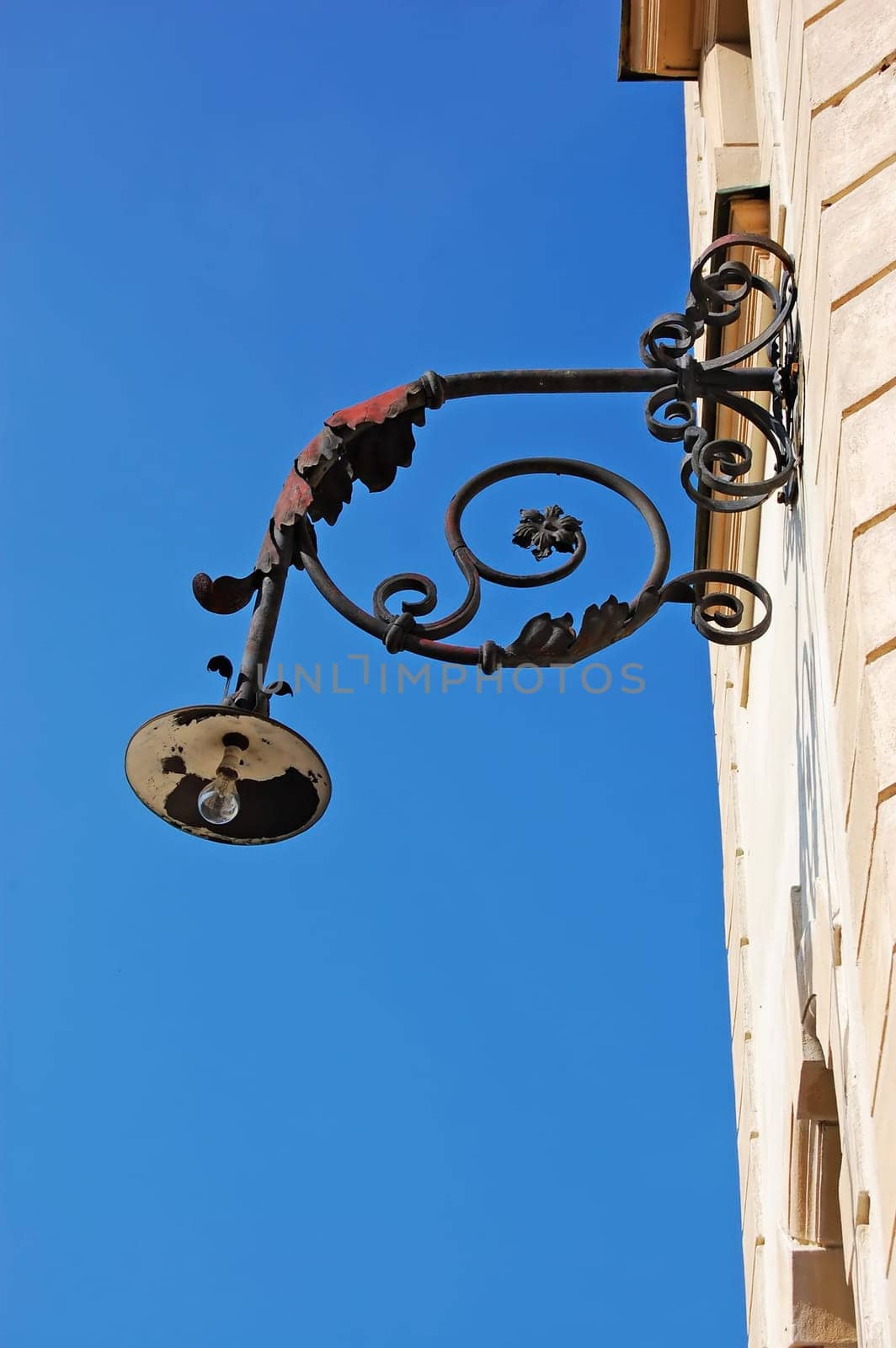 Street lamp on side of the building