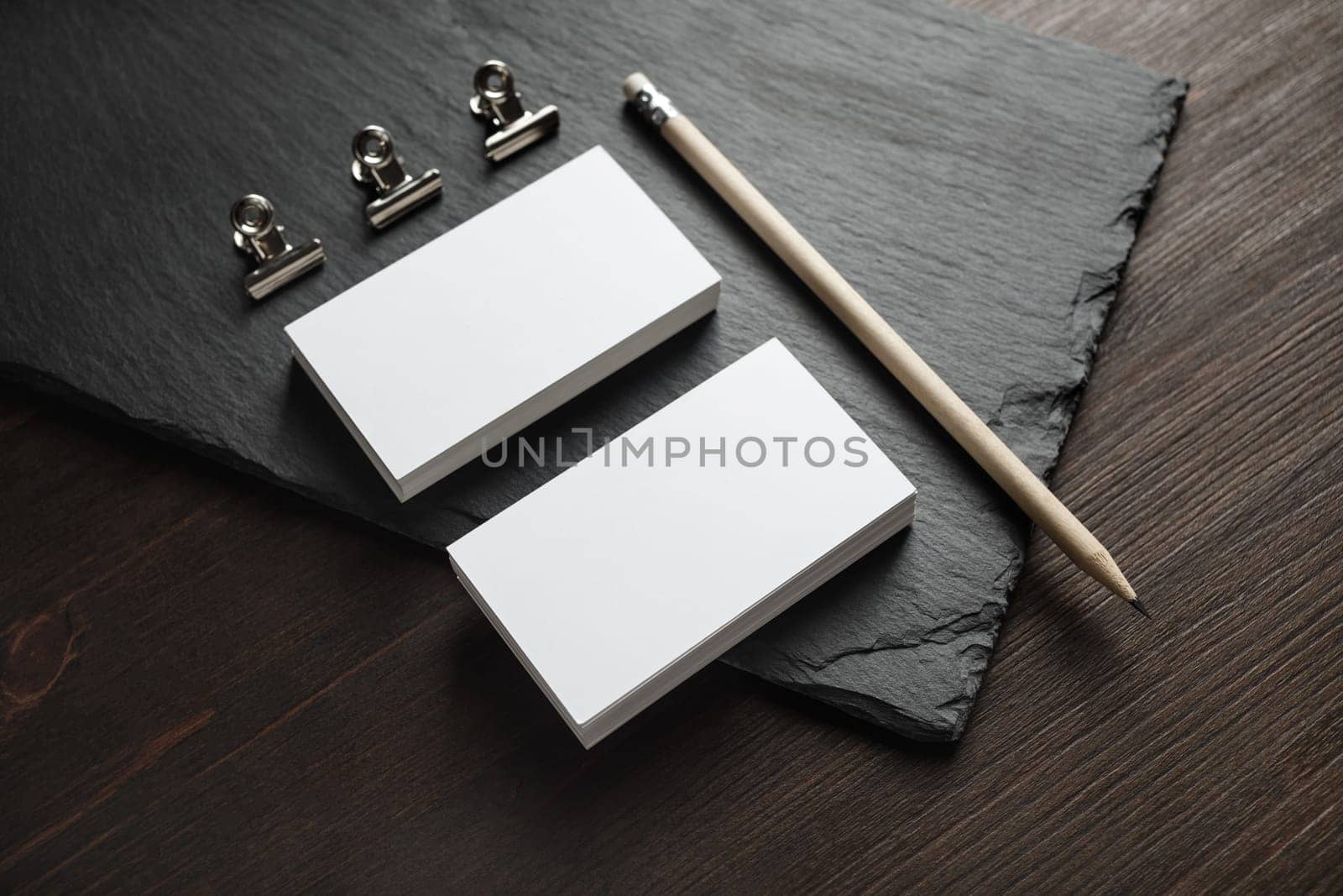 Blank business cards, pencil and clips. Template for graphic designers portfolios.