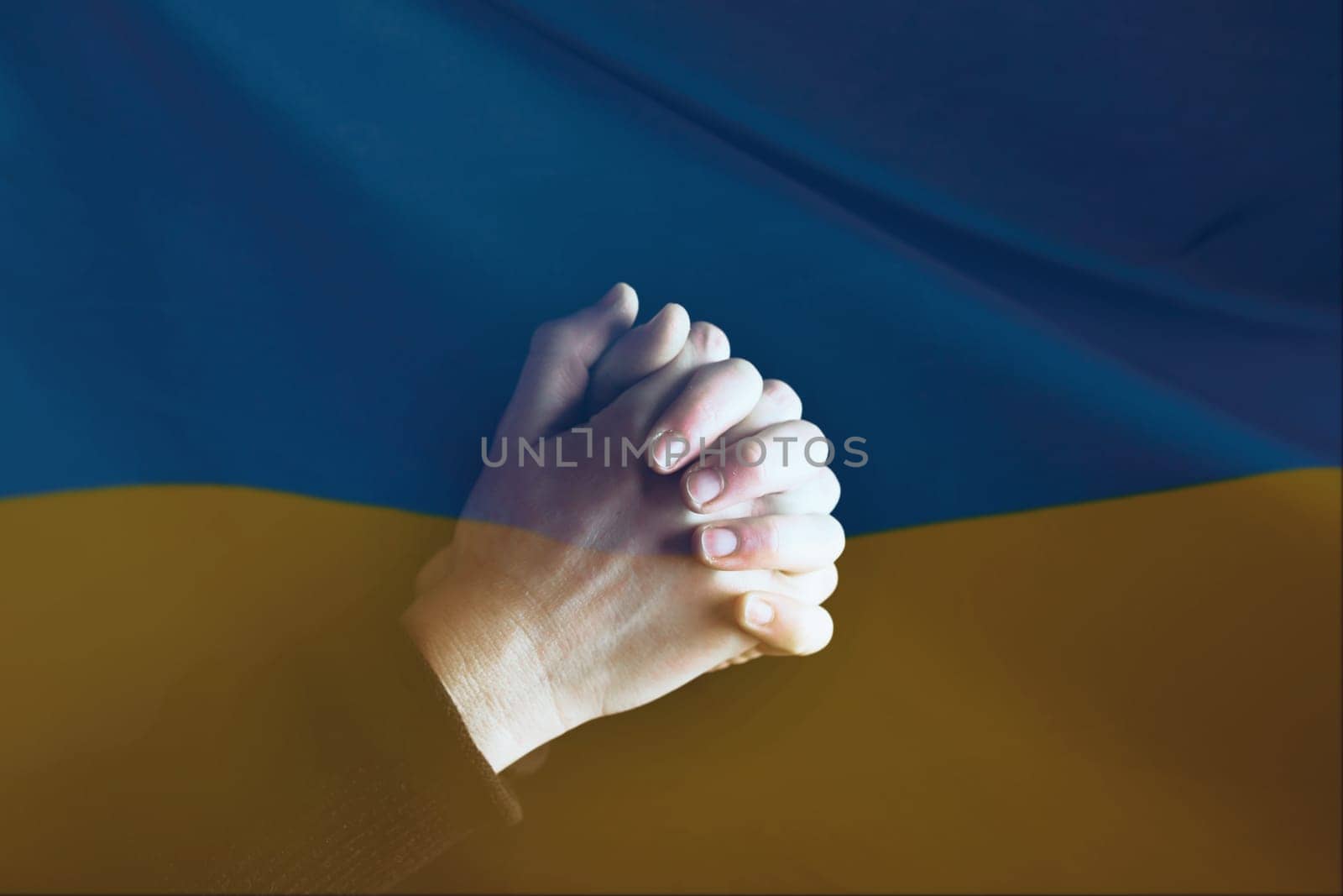 Pray for Ukraine concept background. National Ukrainian flag. Concept symbol of help support and no war in the country of Ukraine.