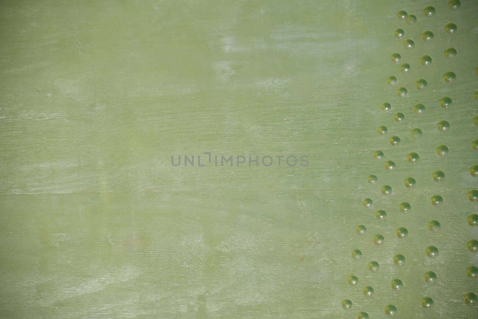 A pastel green as the background.
