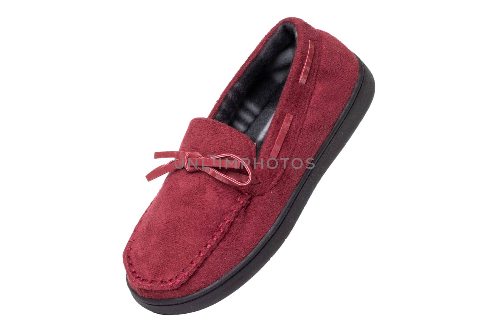 Slippers isolated. Close-up of a single of female red warm and soft cosy terry house slippers isolated on white background.  Womans shoes. Macro.
