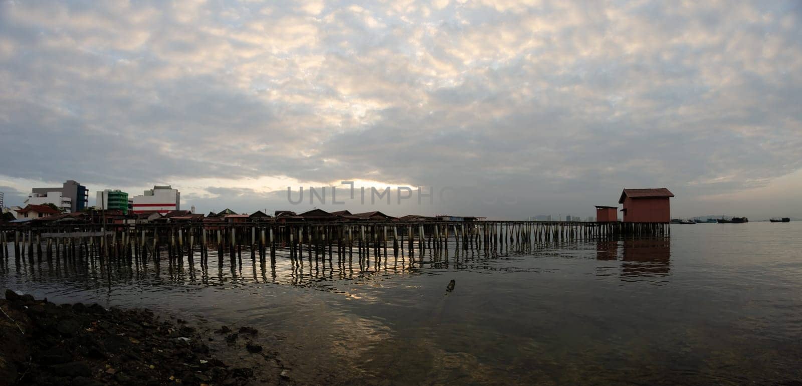 Penang clan jetty on the wooden stilt house in sunrise morning