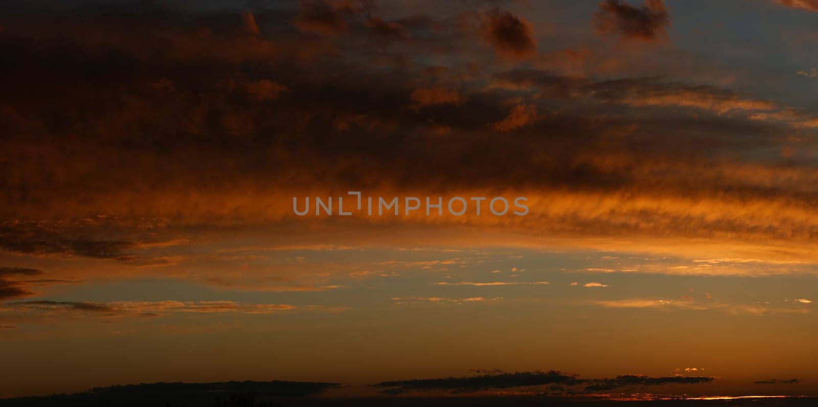 panoramic yellow sunset with clouds