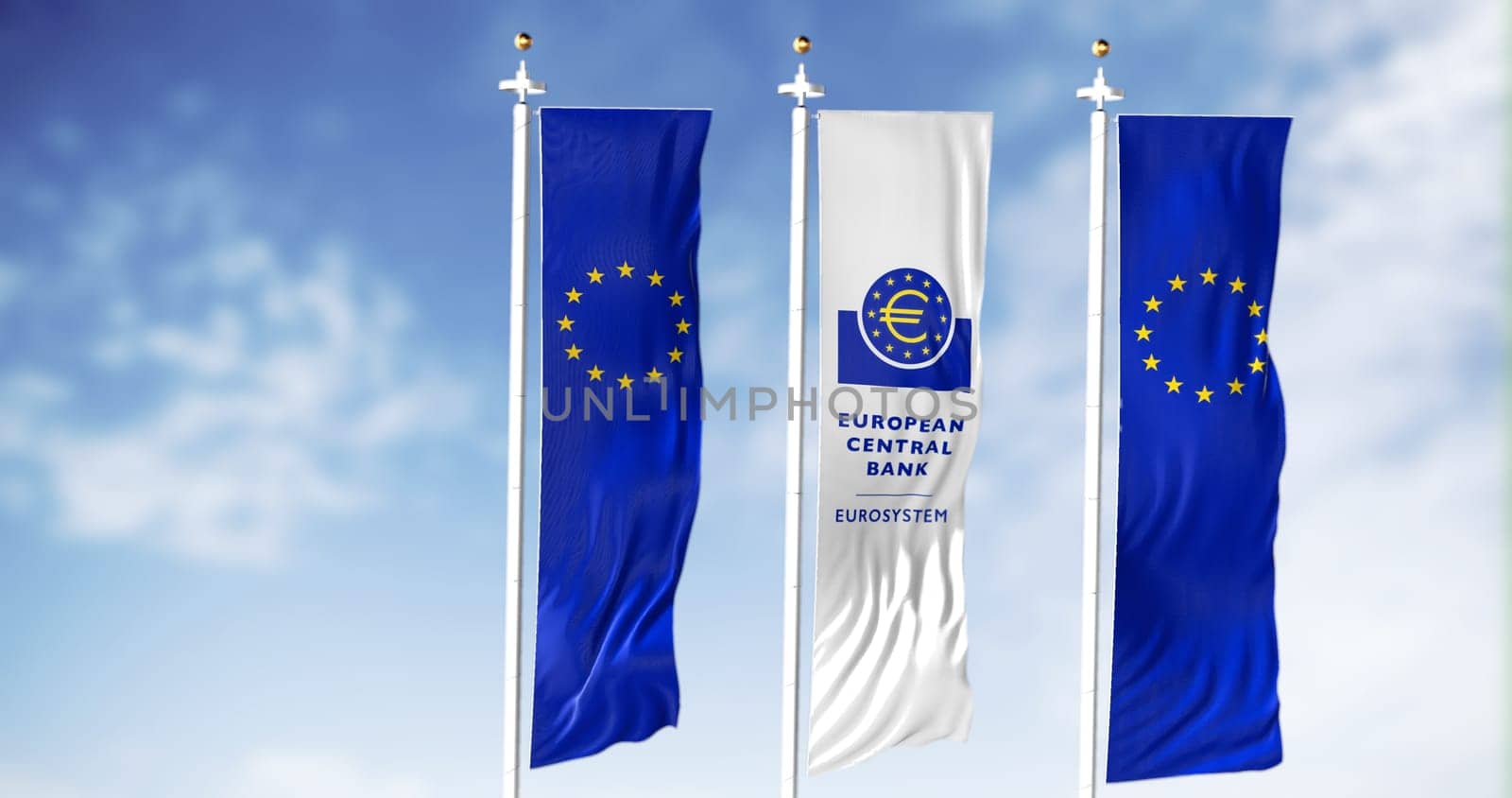 Frankfurt, Germany, February 2022: European flags waving in the wind with the white flag of the European Central Bank in the centre