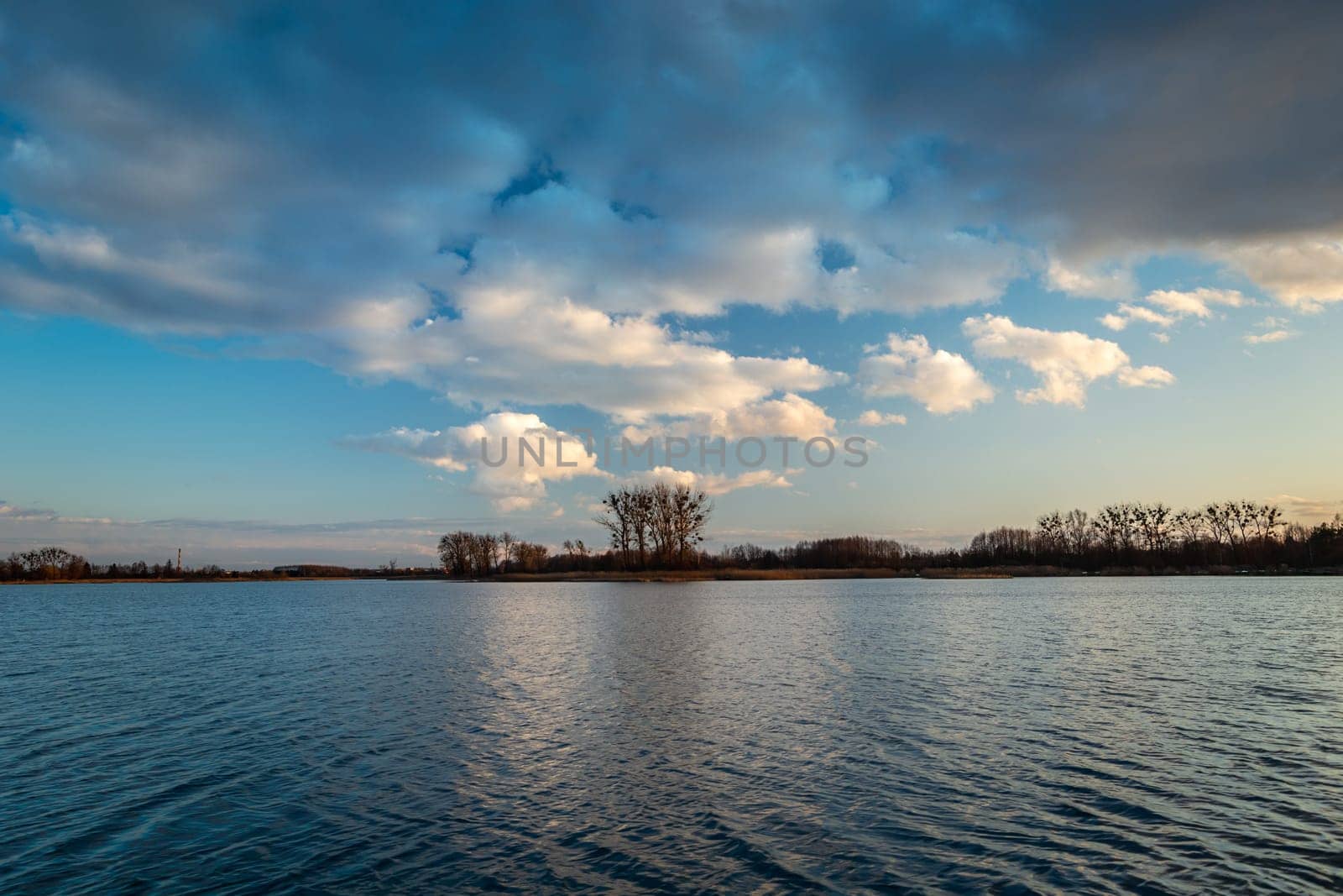 Evening clouds over a calm lake, Stankow, Lubelskie, Poland