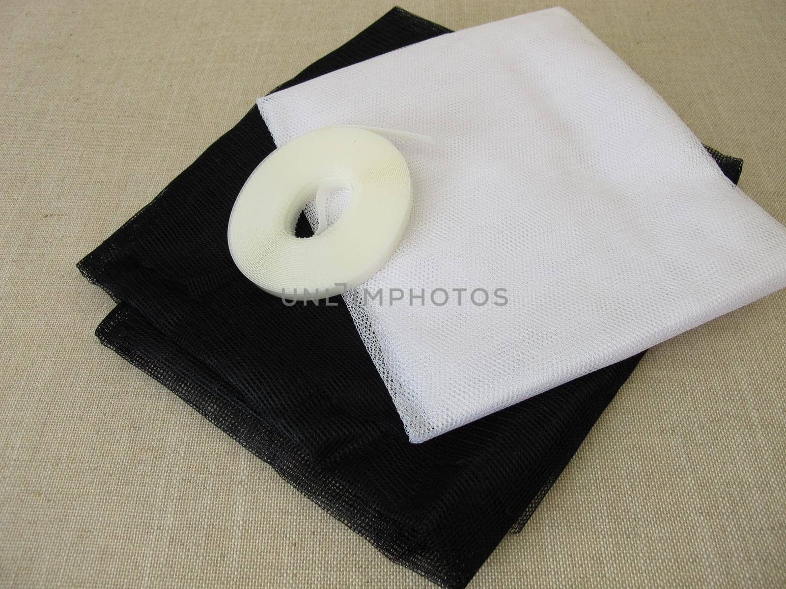 Insect screens for the window in white and anthracite and fixing tape