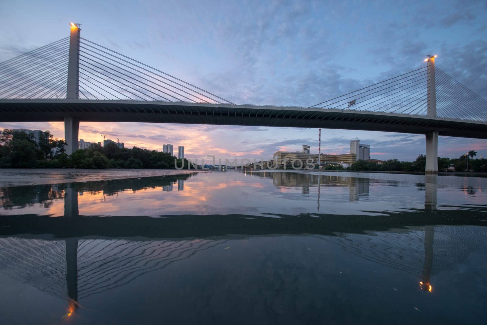 Seberang Perai, Penang, Malaysia - Circa Jun 2018: Reflection of Prai River Bridge in dusk hour