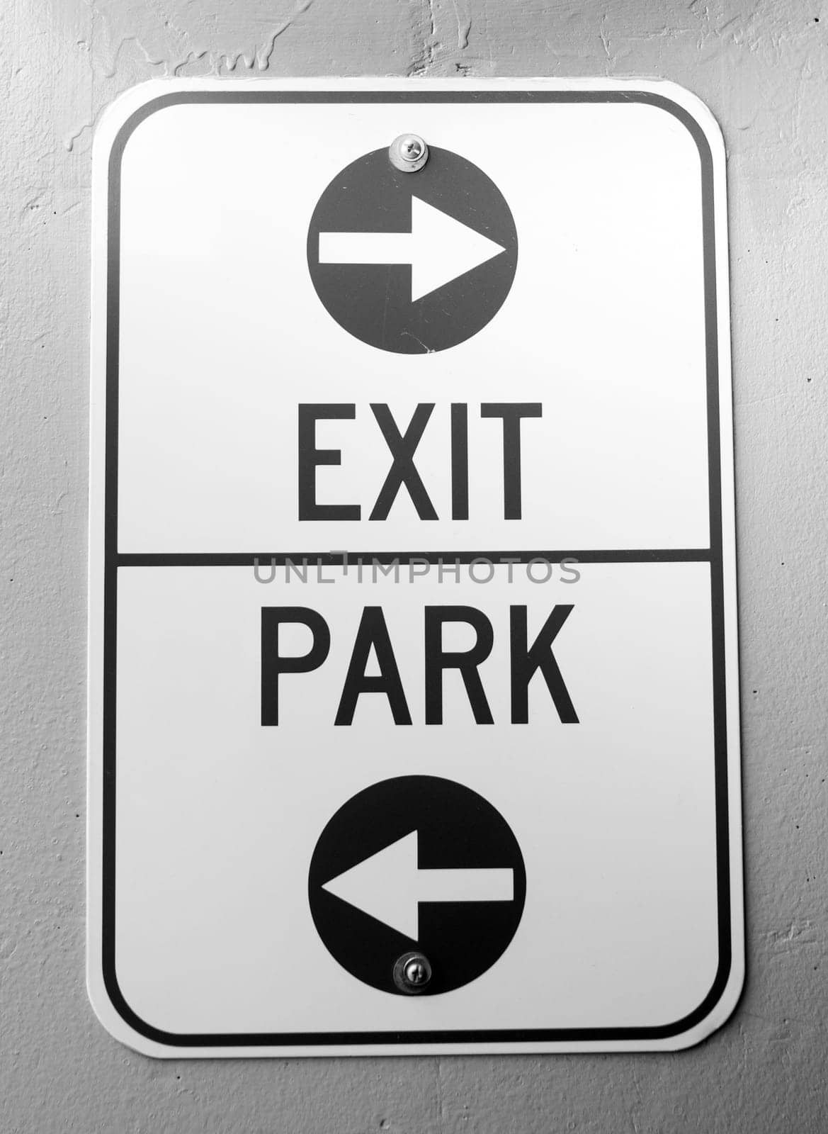 Signs lead the way through a local parking garage