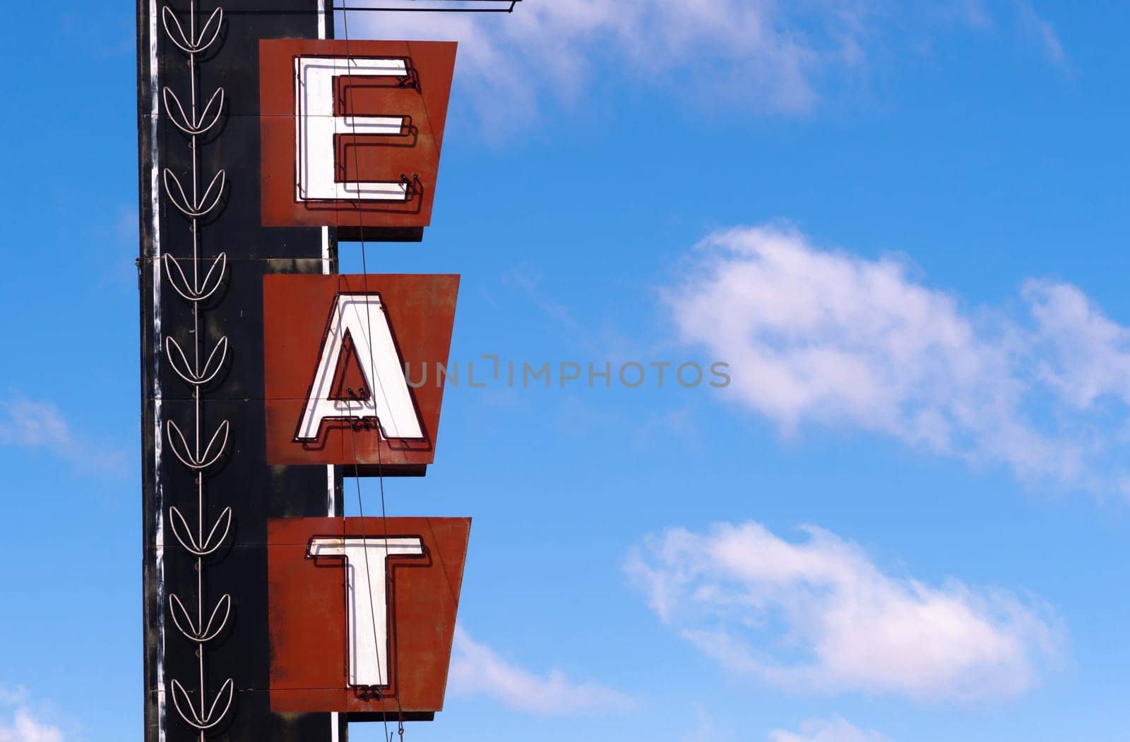 Advertising sign designed to tell you food is available here