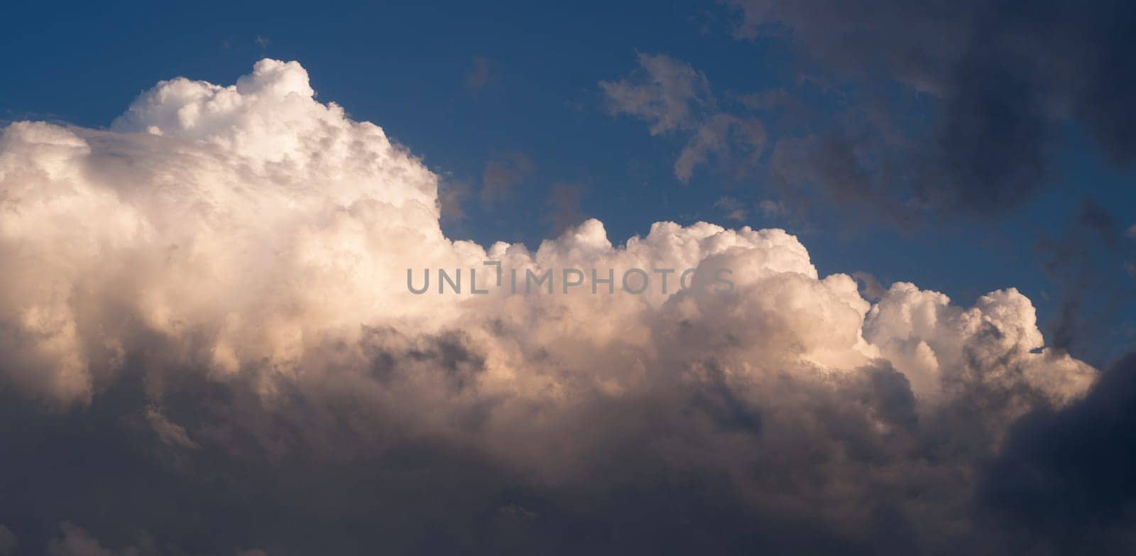 Rolling clouds filled with light right before sunset