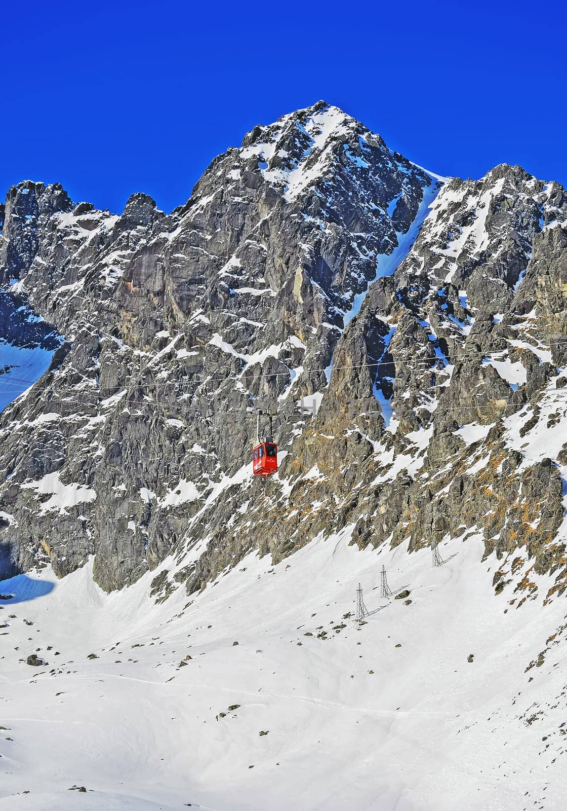 Mountains in winter with cable car