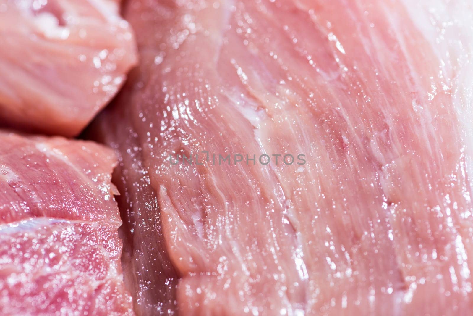 Closeup top view piece fresh raw meat of pork