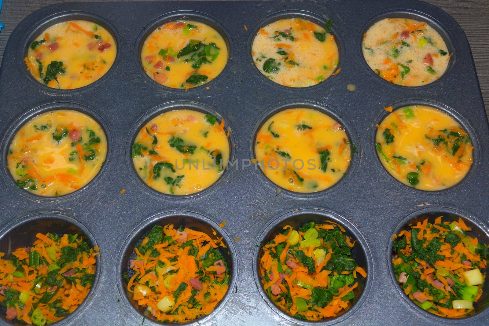 Healthy vegan oat muffins, apple and banana cakes in vintage pan Grey textile background Top view