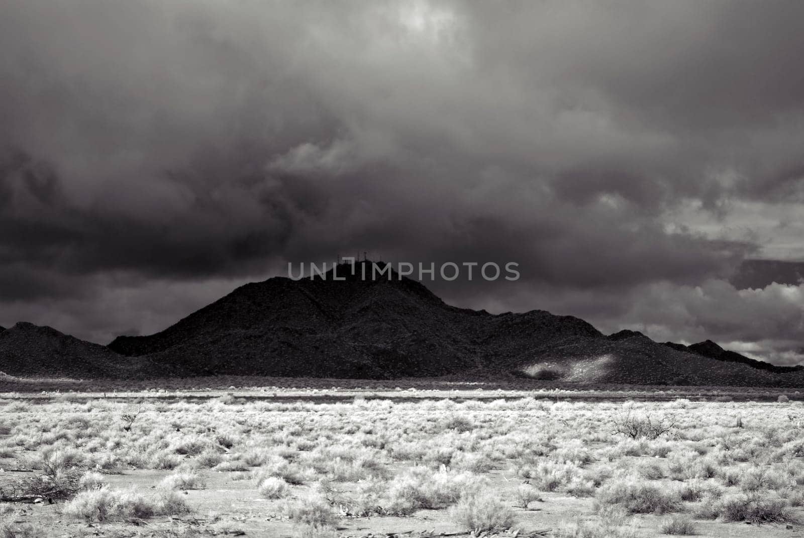 Desert storm over the southwestern desert and mountains .