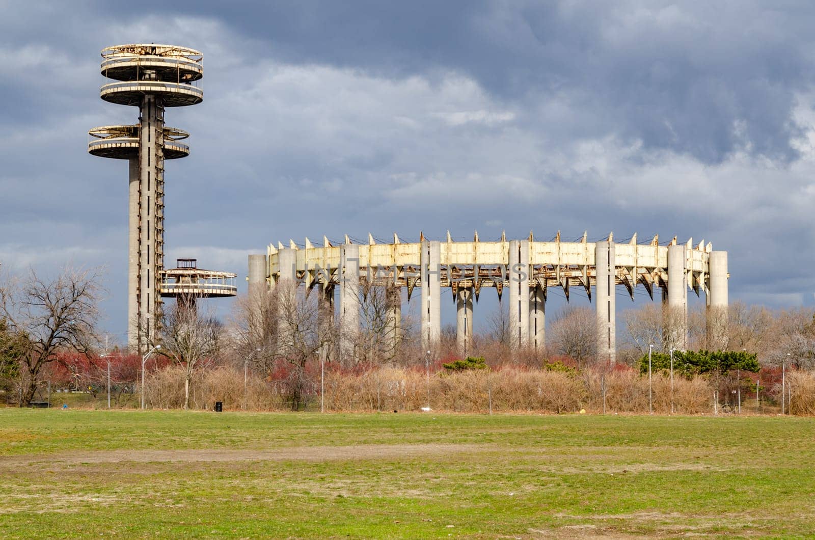 New York State Pavilion Observation Towers with Queens Theatre, Flushing-Meadows-Park, Queens, New York City during overcast winter day, horizontal