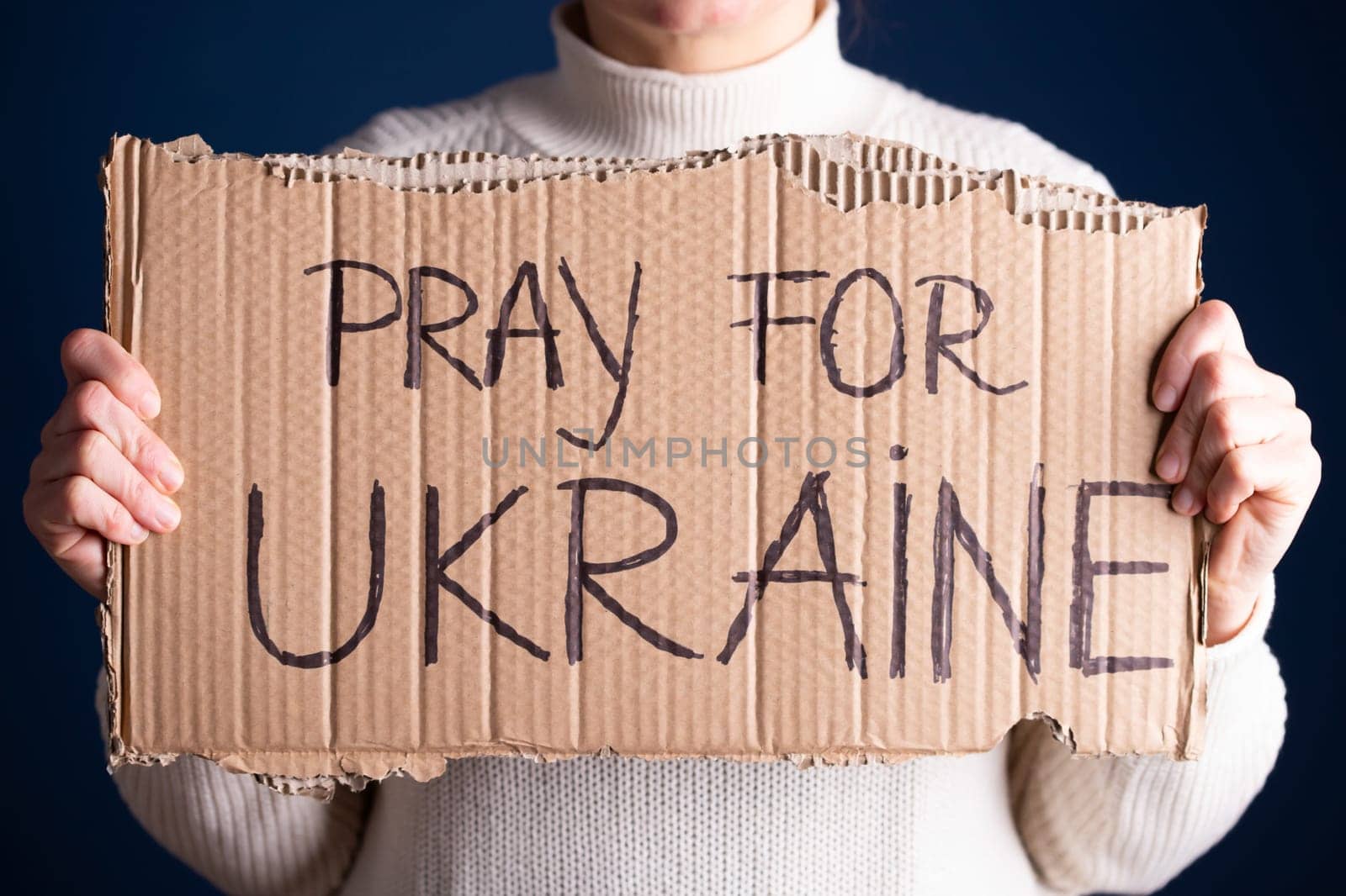 Pray for Ukraine concept background. Concept symbol of help support and no war in the country of Ukraine.