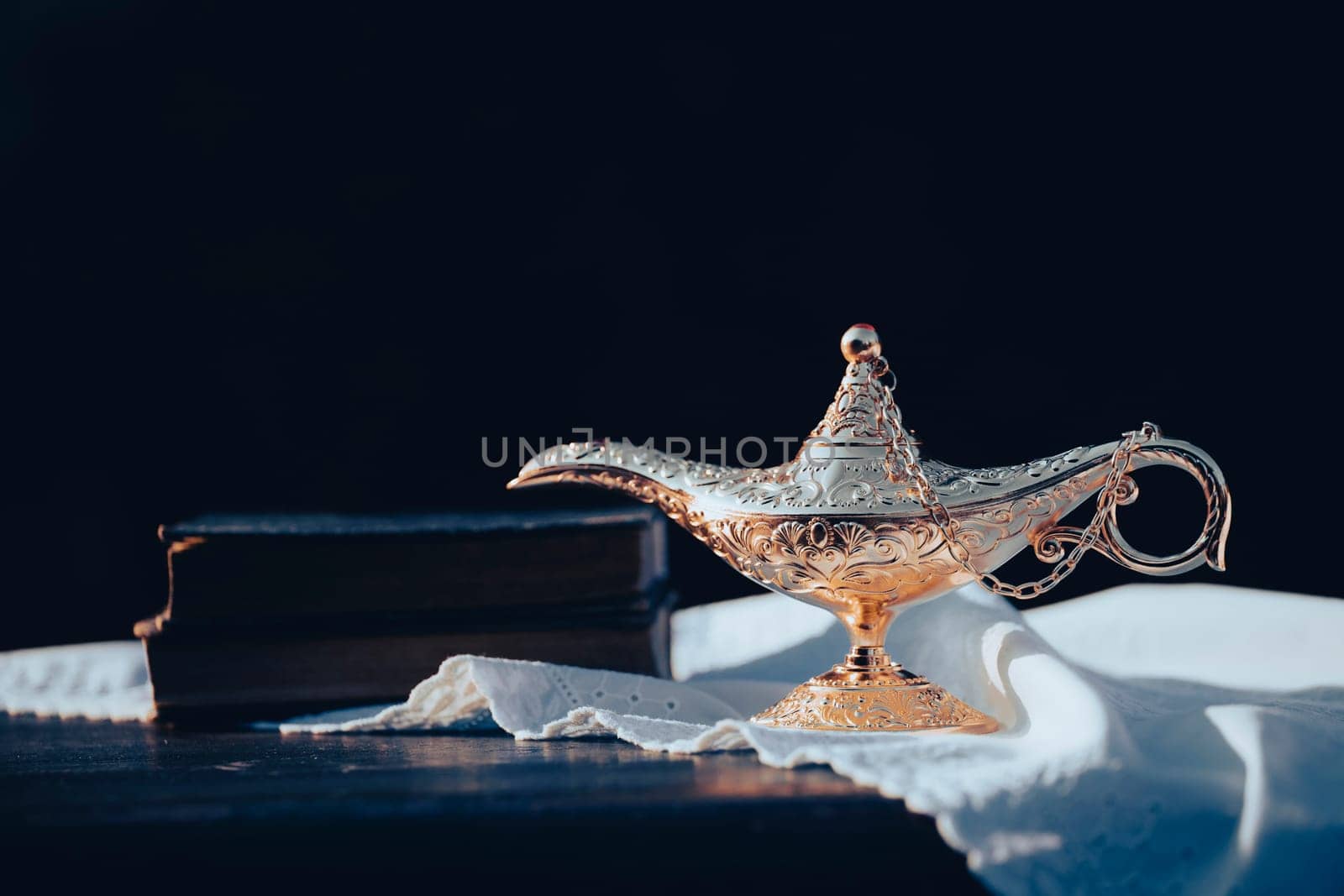 Ramadan Kareem festive greeting card for Muslim holy month with Aladdin lamp of wishes and Quran