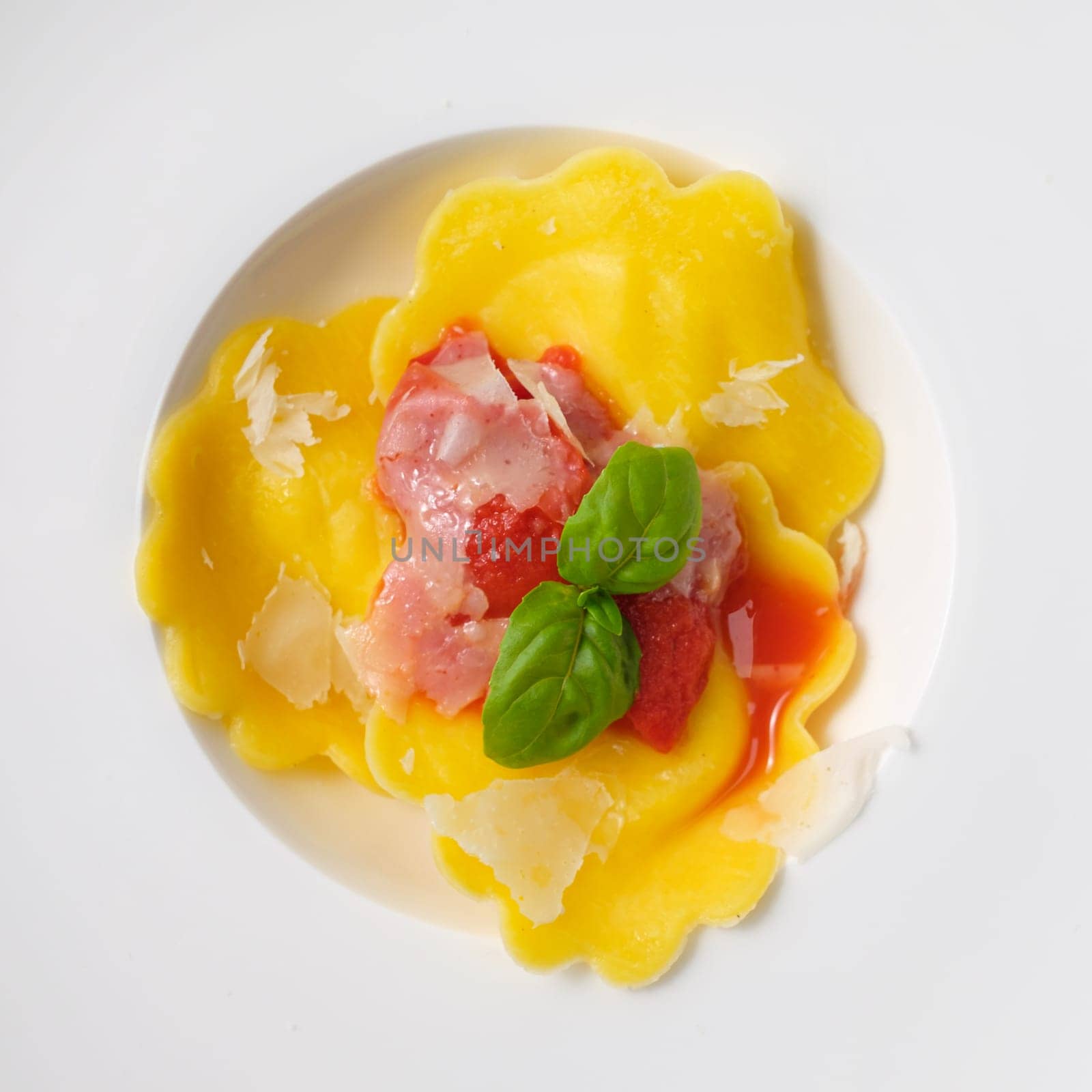 Stuffed tortellini pasta with tomato sauce and parmesan cheese