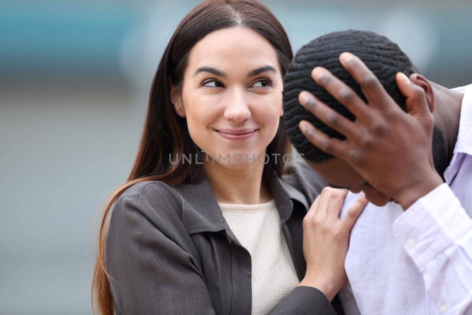 Happy false friend consoling a desperate man