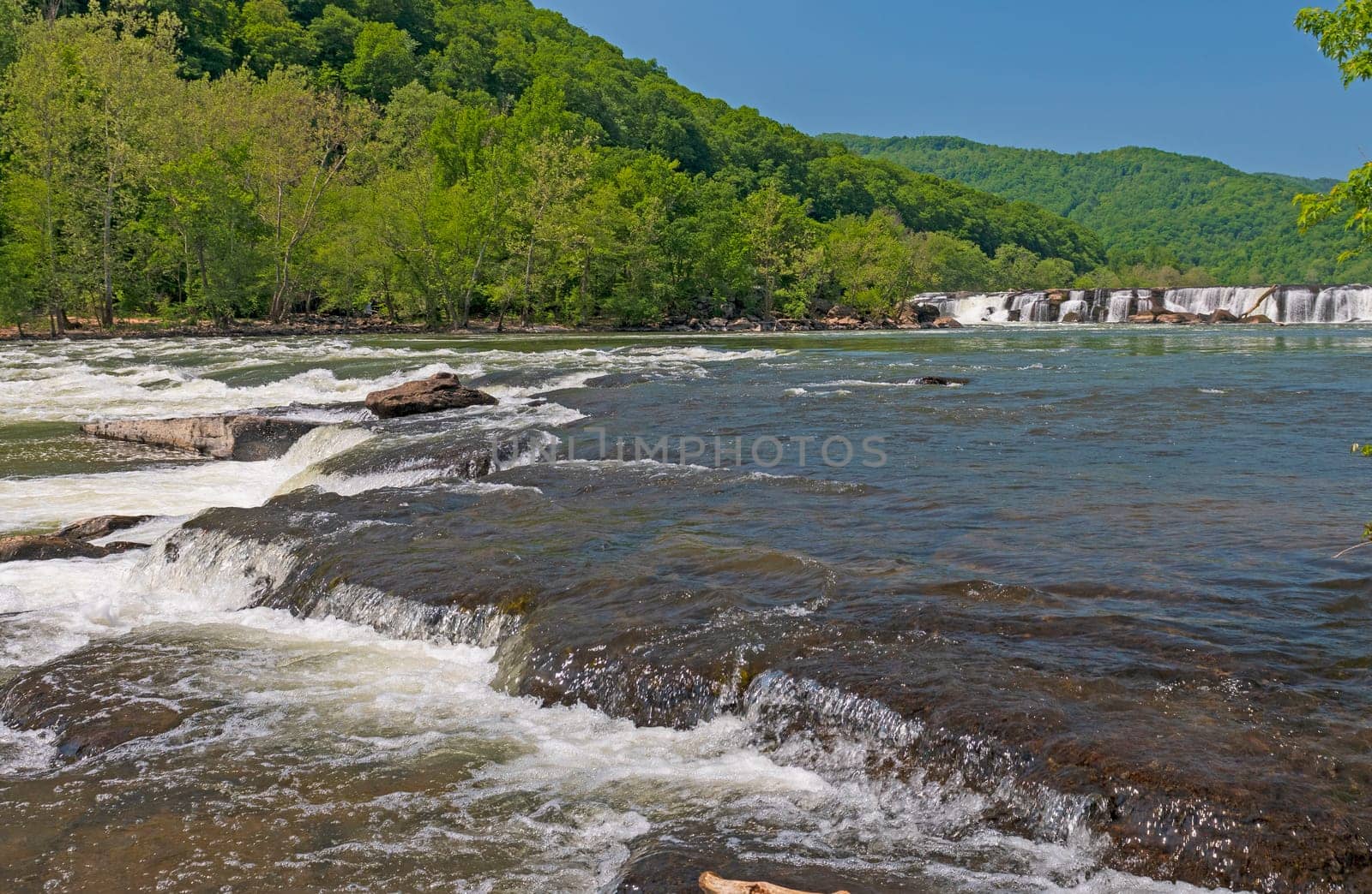 Rapids and Falls in a Mountain Stream in Spring on Sandstone Falls on the New River in West Virginia