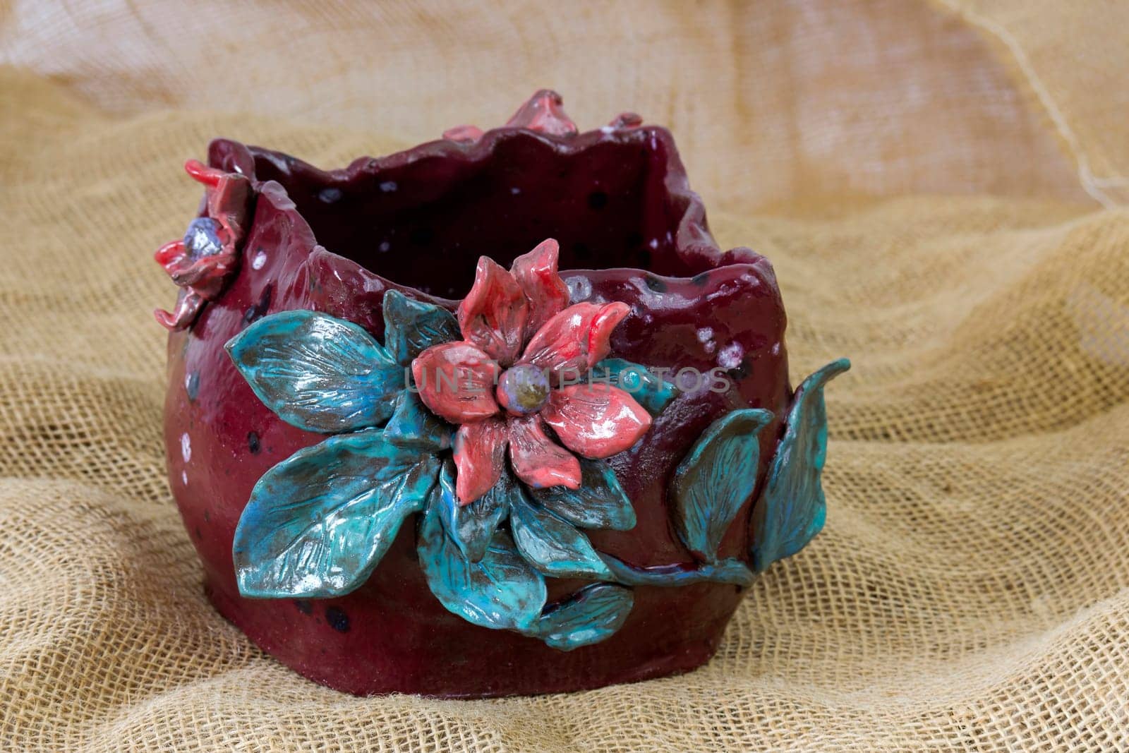 clay pot with flower decoration - handmade pottery
