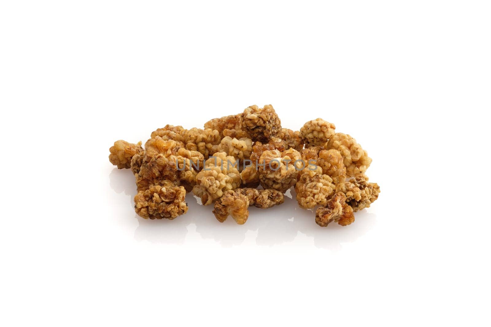 Dried red mulberry fruits on white isolated