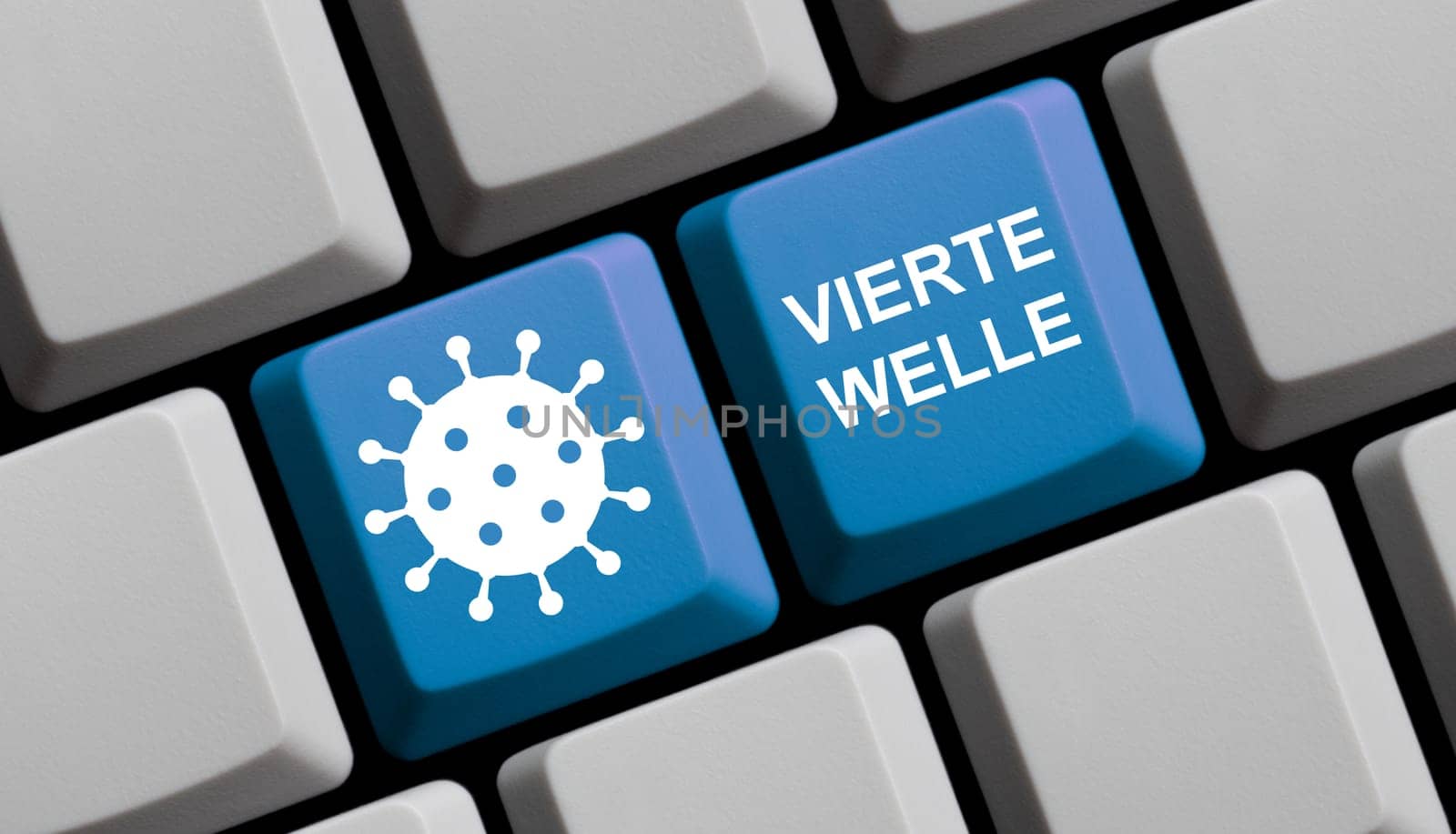 Fourth coronavirus wave in german language on blue keyboard