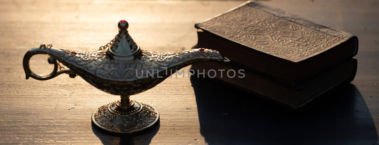 Ramadan Kareem festive greeting card for Muslim holy month with Aladdin lamp of wishes and Quran