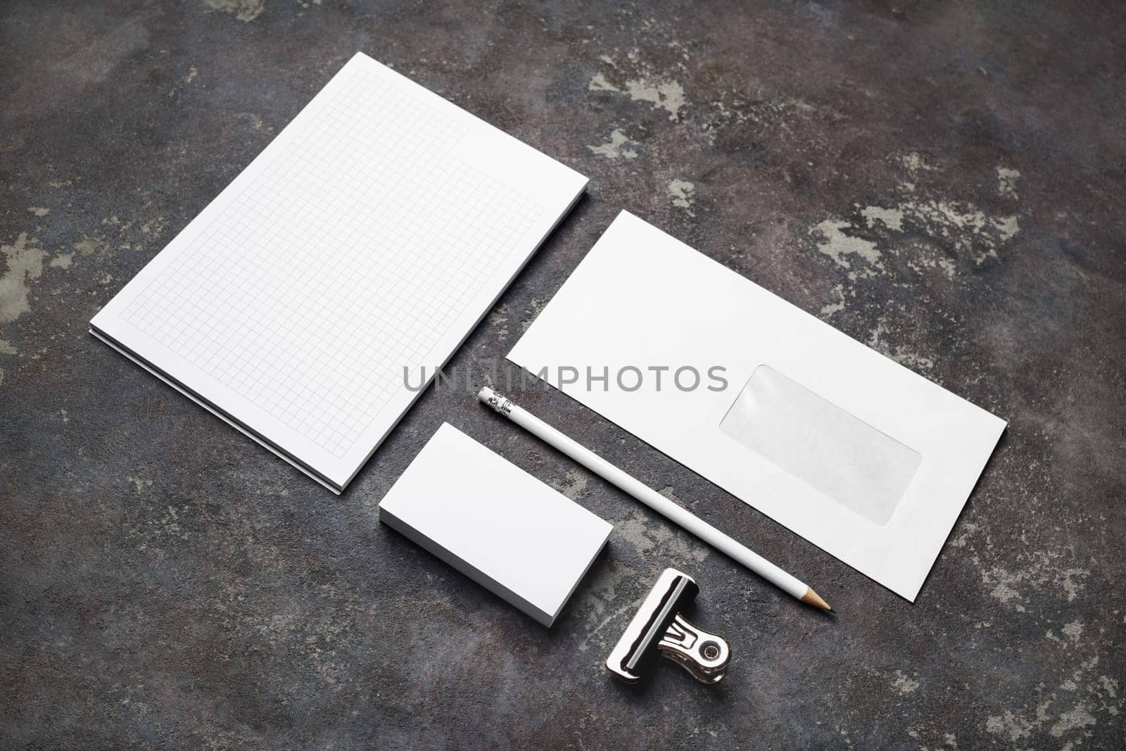 Blank branding identity set on concrete background. Corporate identity template. For design presentations and portfolios.