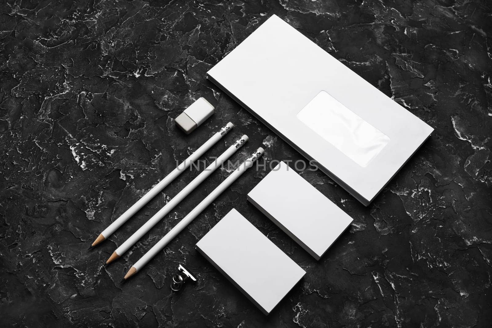 Blank stationery template on black plaster background. Mockup for branding identity for placing your design.