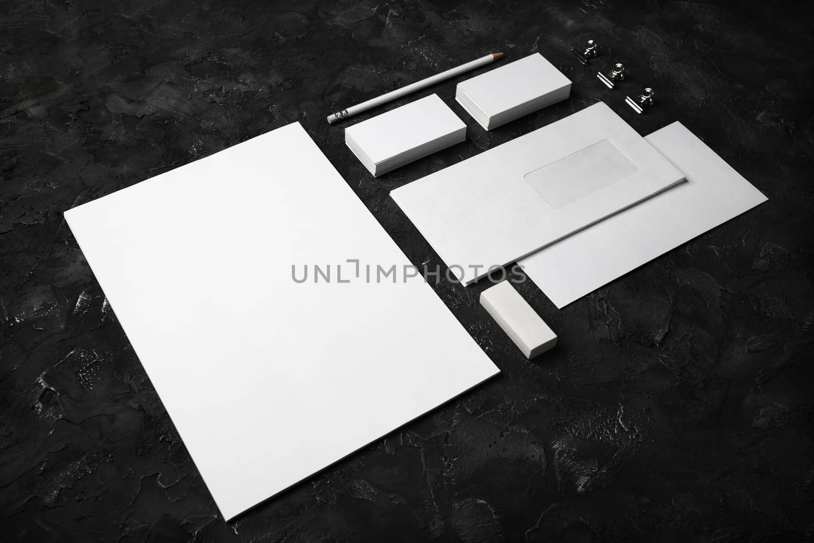 Blank stationery set on black plaster background. ID template. Mockup for branding identity for designers.