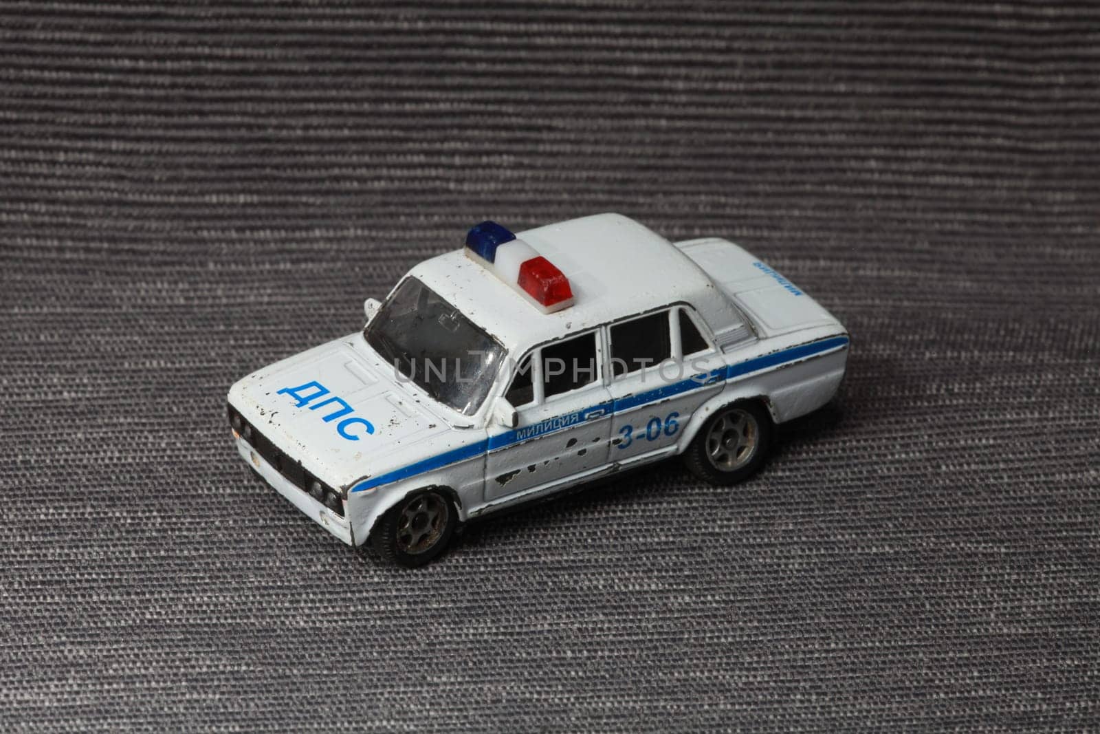 police car small children's toy close-up