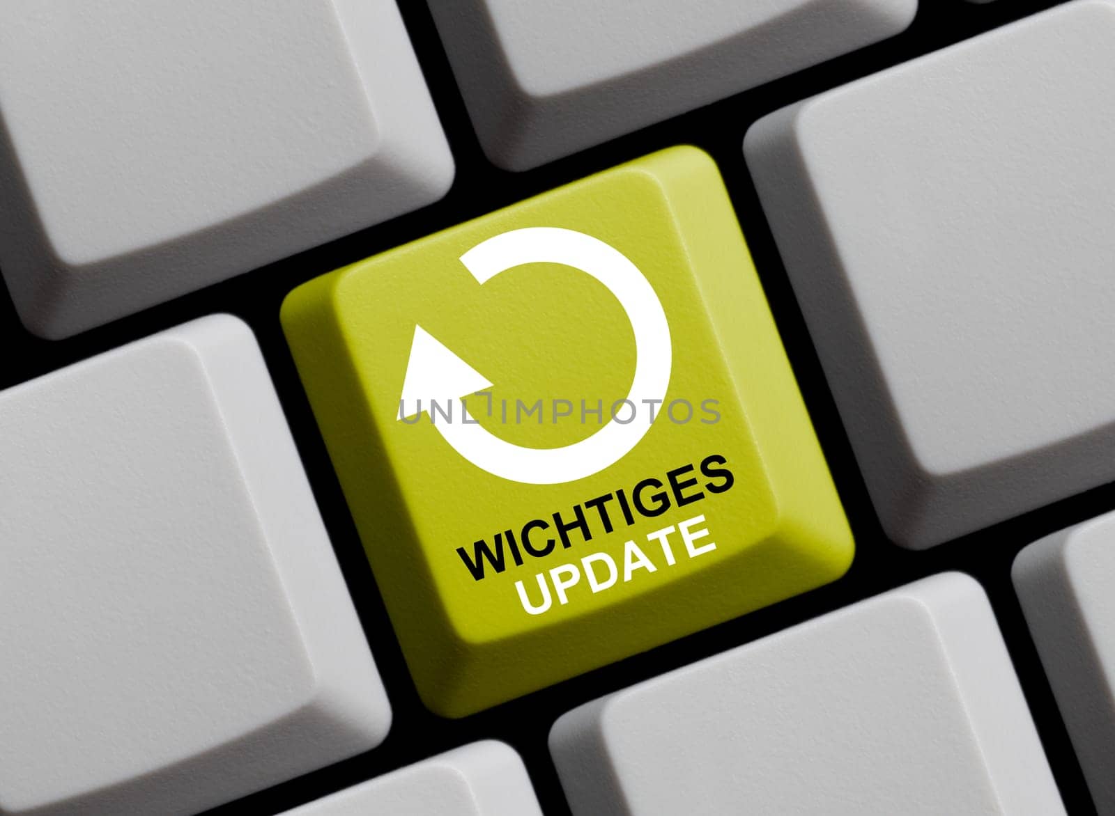 Computer Keyboard showing Importatnt Update in german language 3D Illustration